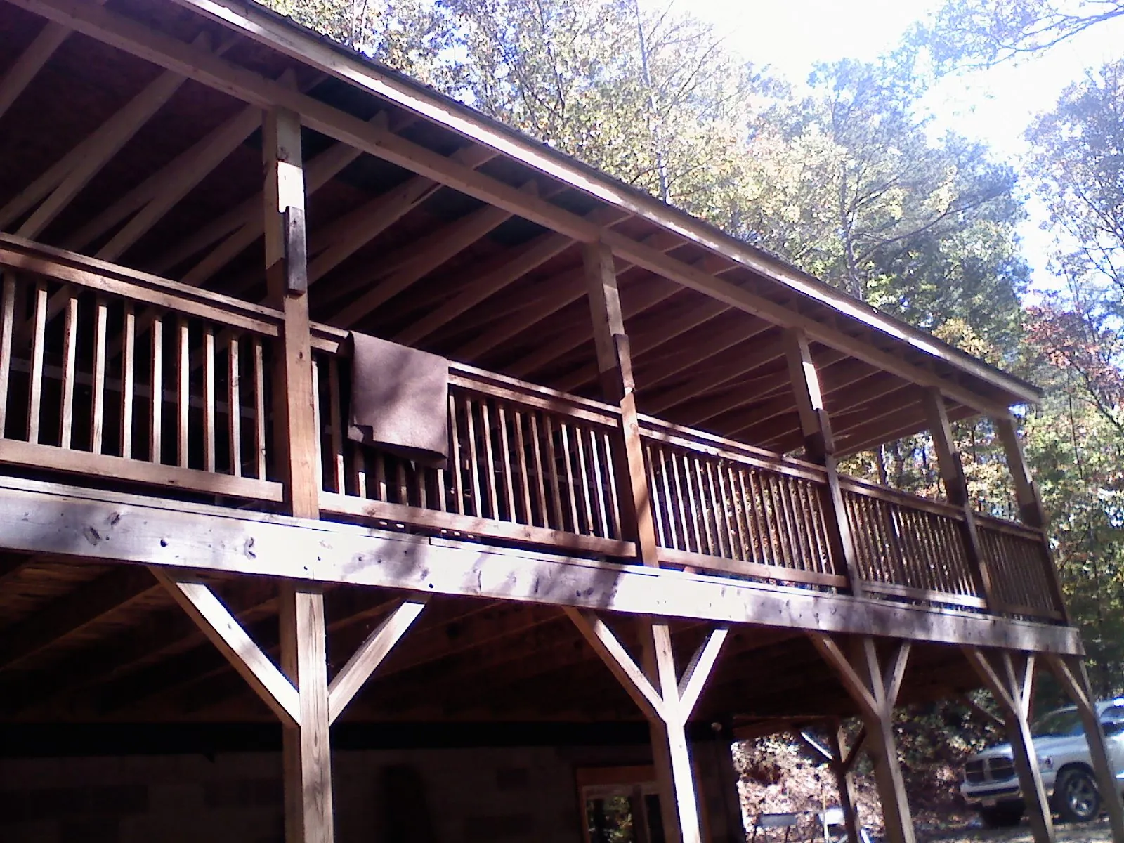 Timber framing under a new elevated porch and deck — Roof Leak Repair in Hartland by Roofing Brothers